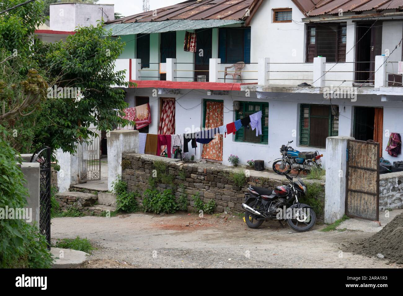Motorbikes parked in house, Almora, Uttarakhand, India, Asia Stock Photo