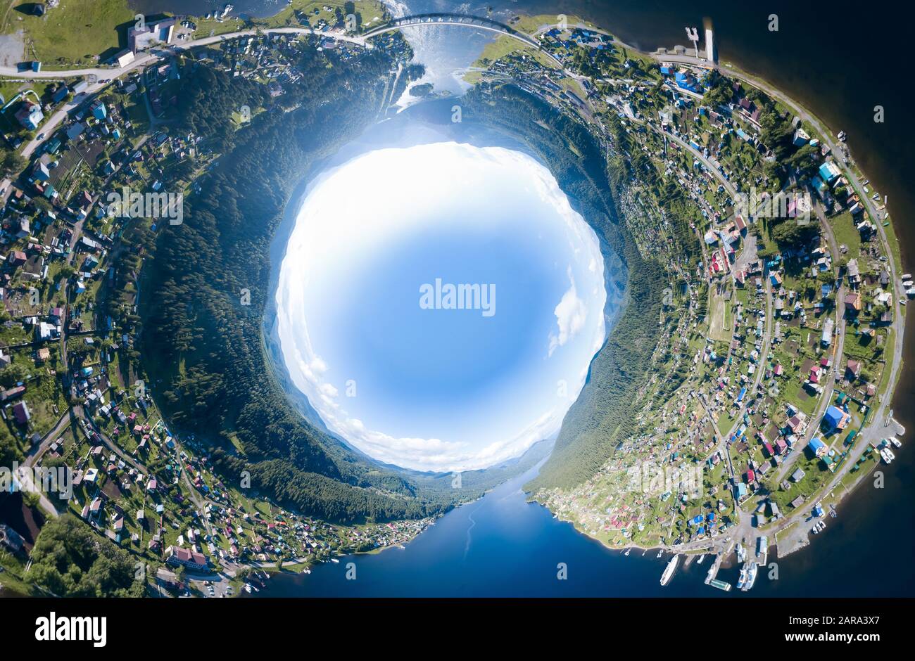 360 degree panoramic drone view of an abstract world turned inside out planet earth with nature picturesque landscapes near a w Stock Photo - Alamy