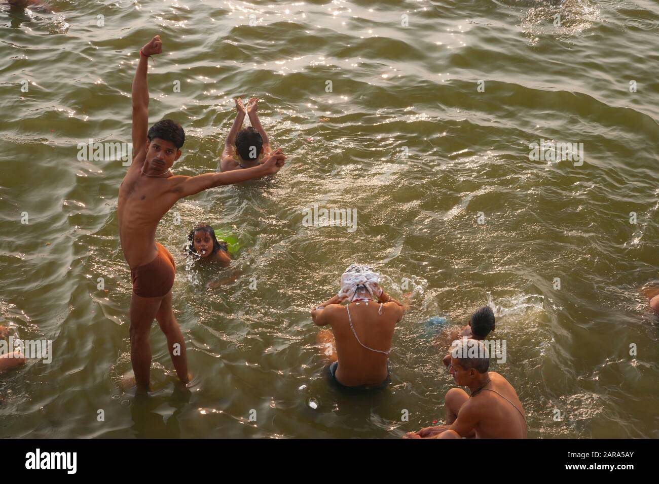 men-bathing-in-morning-at-ghats-of-holy-ganges-river-also-ganga-river