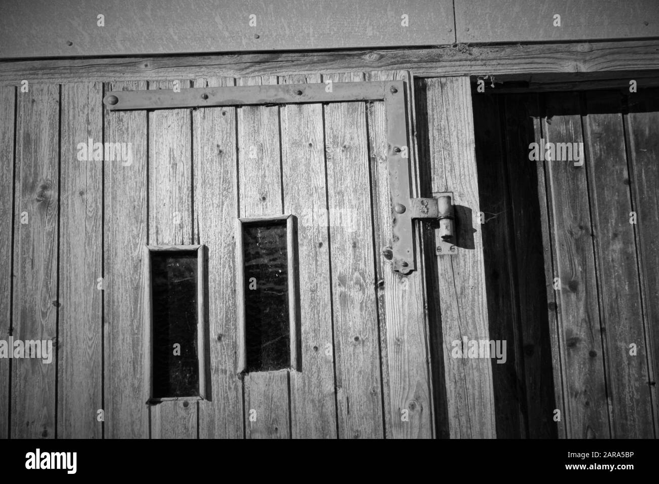 Grand wooden door Black and White Stock Photos & Images - Alamy