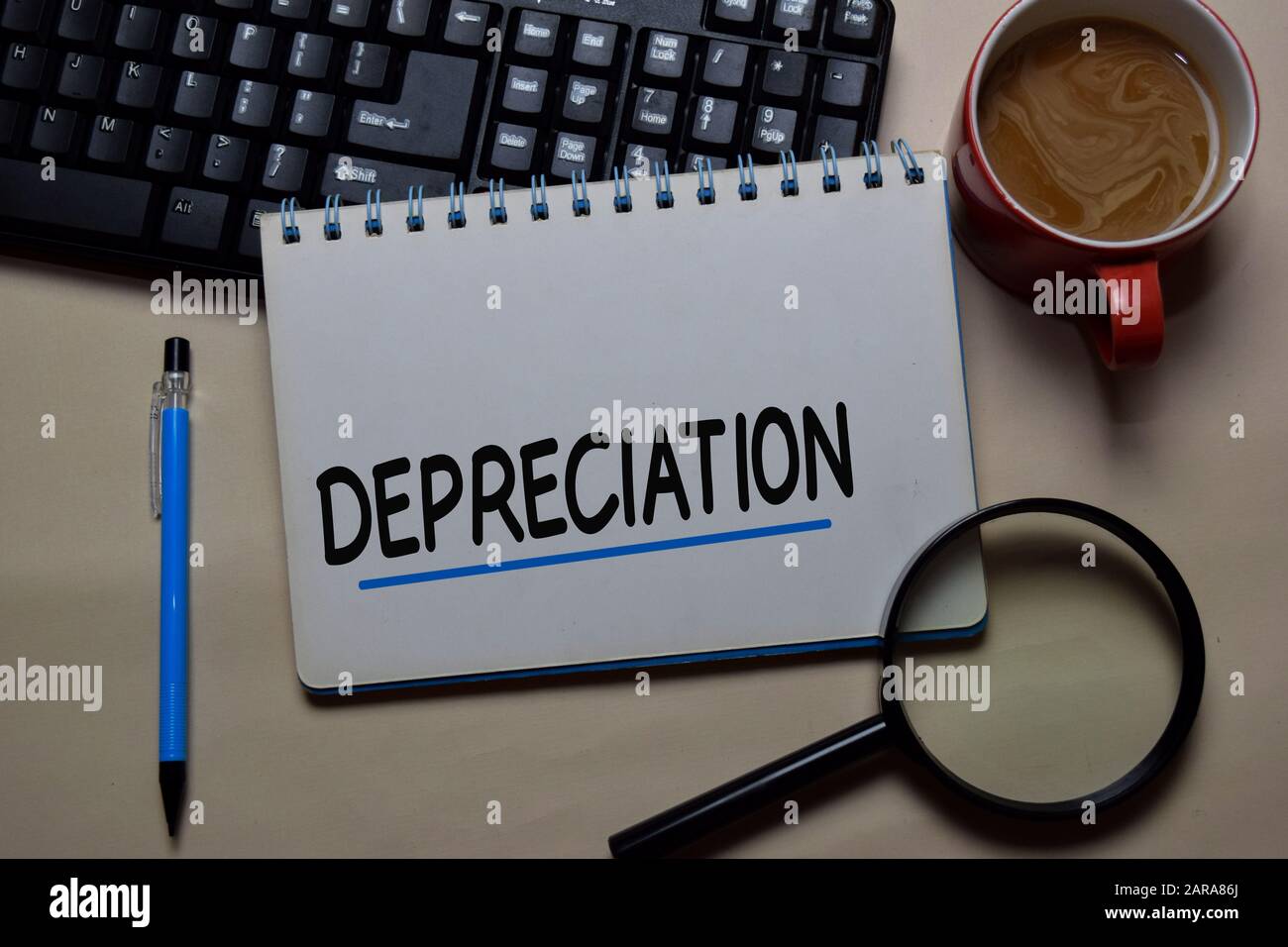Depreciation write on a book isolated on office desk Stock Photo Alamy