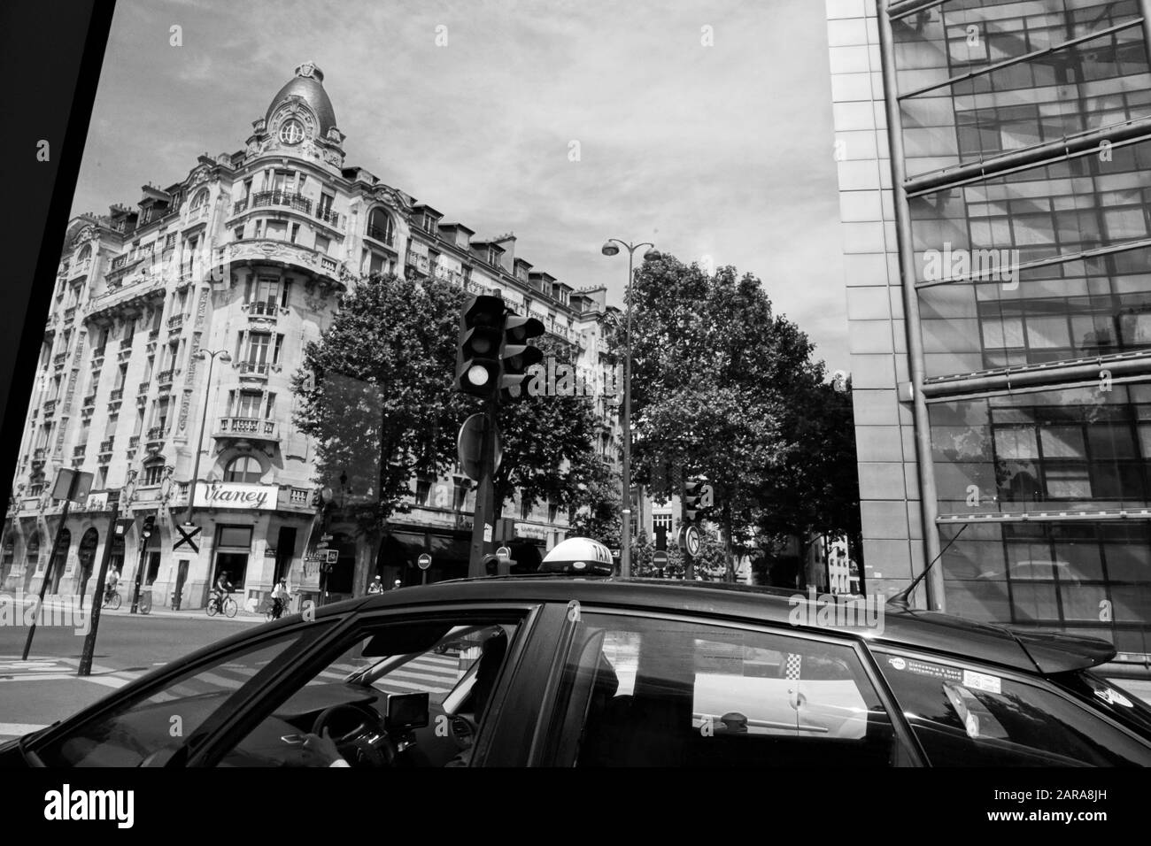 Street with old and new building, signal and taxi, Paris, France, Europe Stock Photo
