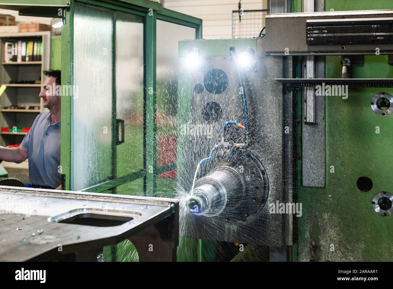 Worker operating industrial milling machine Stock Photo Alamy