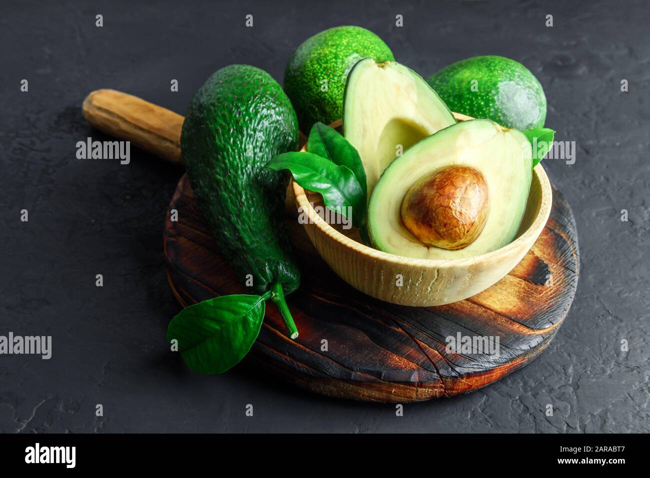 Fresh Avocado in eco bag for fruits and vegetables Stock Photo - Alamy