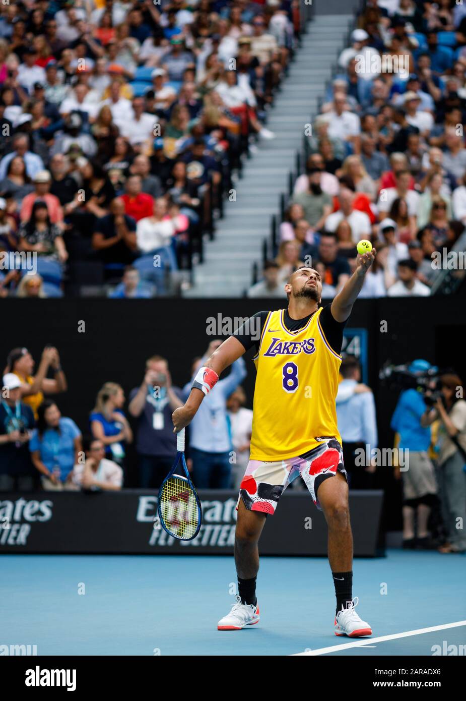 NICK KYRGIOS (AUS) wears a Lakers jersey to commemorate the passing of Kobe Bryant during a warm up session prior to his match against Rafael Nadal. Stock Photo