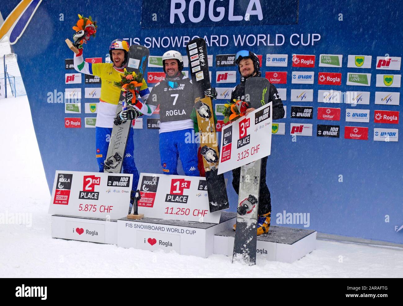 Snowboard parallel slalom men winners in competition for WORLD CUP 2020. ROGLA, Slovenia. 1. Edwin Corrati (Ita); 2. Roland Fischnaller (Ita); 3. Vic Stock Photo