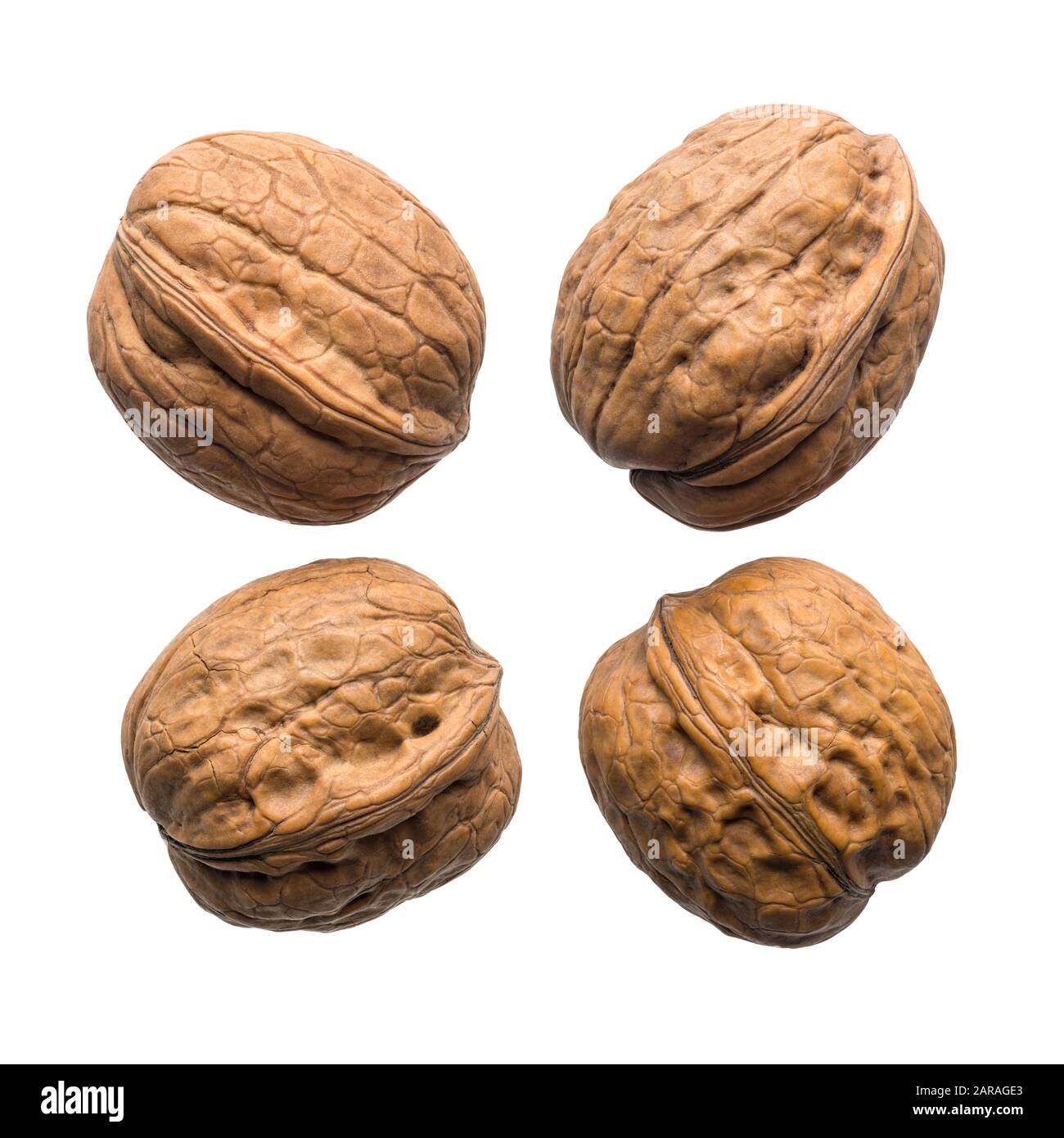 Food and drinks: group of unpeeled walnuts isolated on white background Stock Photo