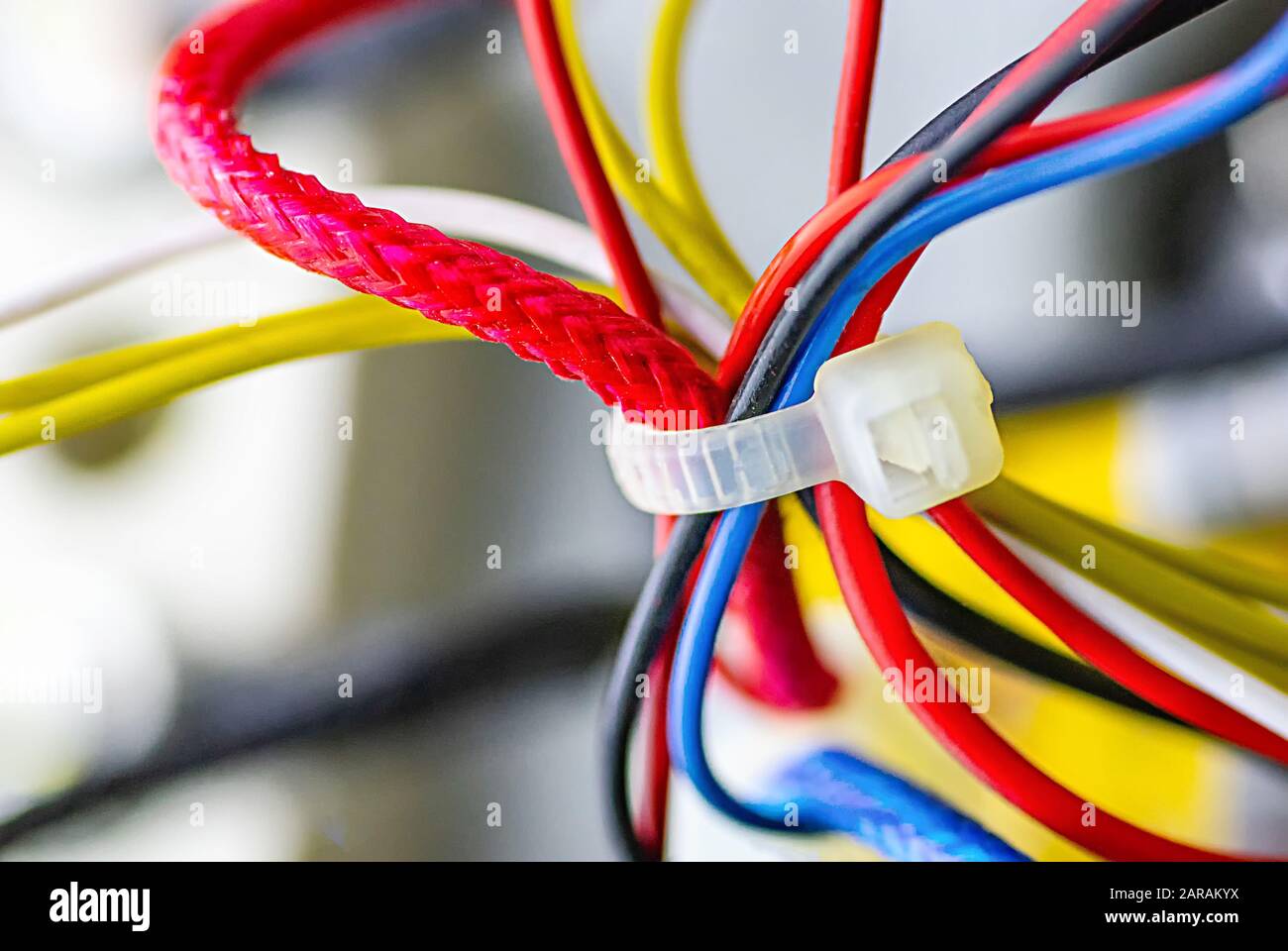 Multicolored electrical cables isolated close up. Selective focus. Stock Photo