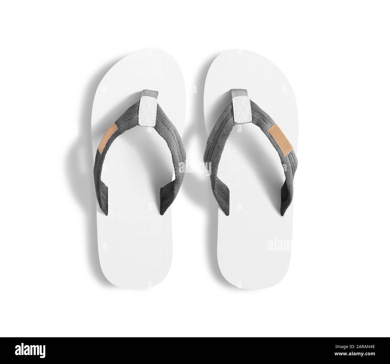 Pair of blank white slippers, design mockup, clipping path. Stock Photo