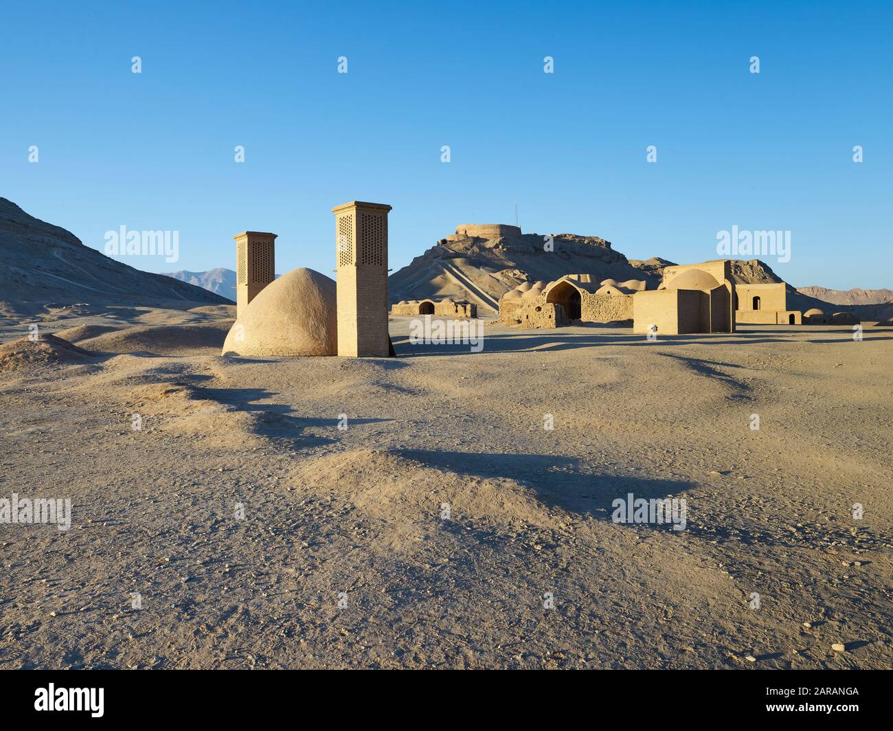 Silence towers on the outskirts of the desert city of Yazd in Iran, taken on November 17, 2017. Zarathustrians who had died until 1960 were kept here, so that the vultures cleaned the bones of the meat. The bones were then collected in the center of the towers. Yazd is one of the oldest cities in Iran with a population of around 650,000 people. The old town was declared a UNESCO World Heritage Site in 2017. | usage worldwide Stock Photo