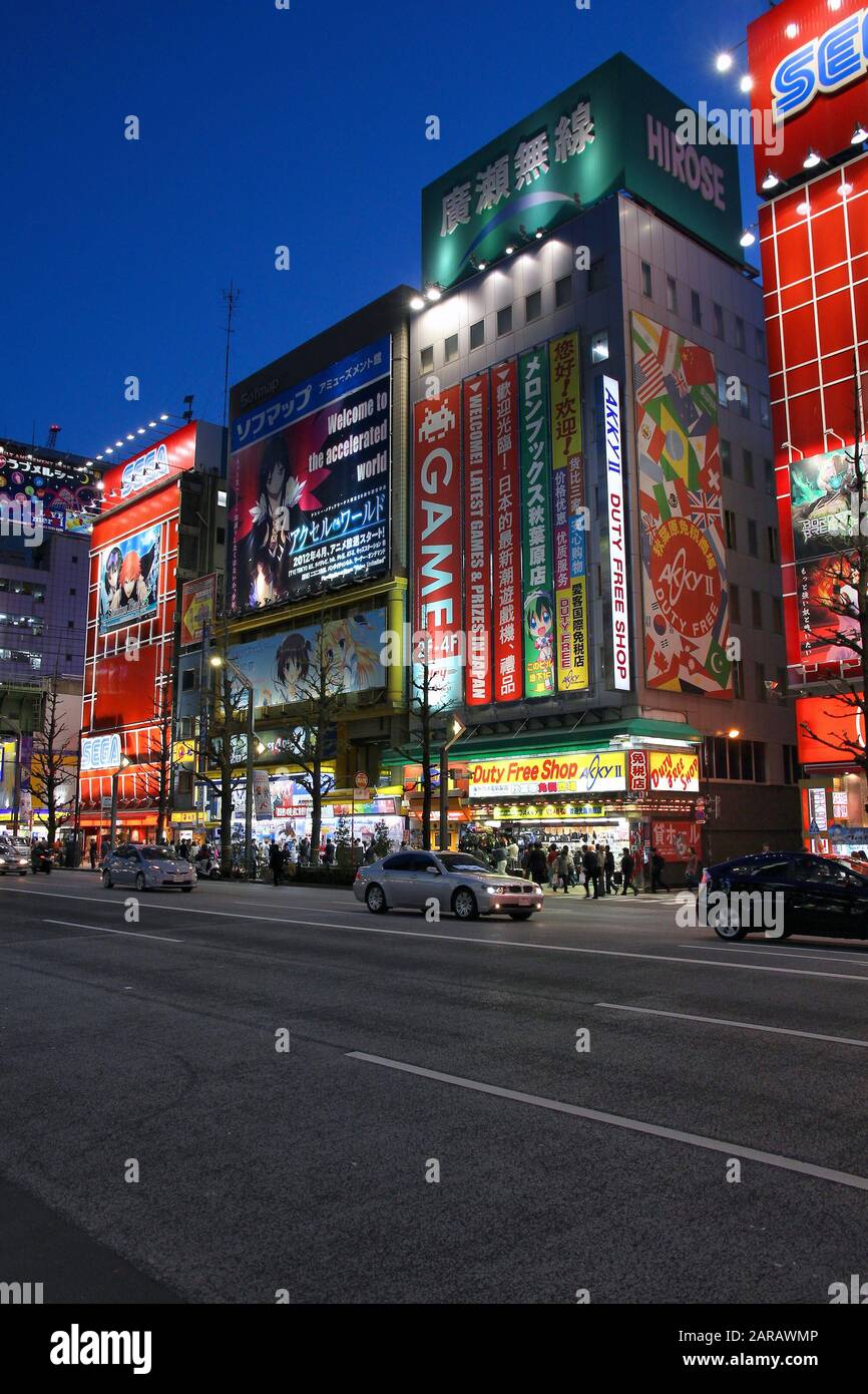 TOKYO, JAPAN - APRIL 12, 2012: People visit Akihabara shopping area in Tokyo. Stores in Akihabara are considered one of best electronics shopping dest Stock Photo