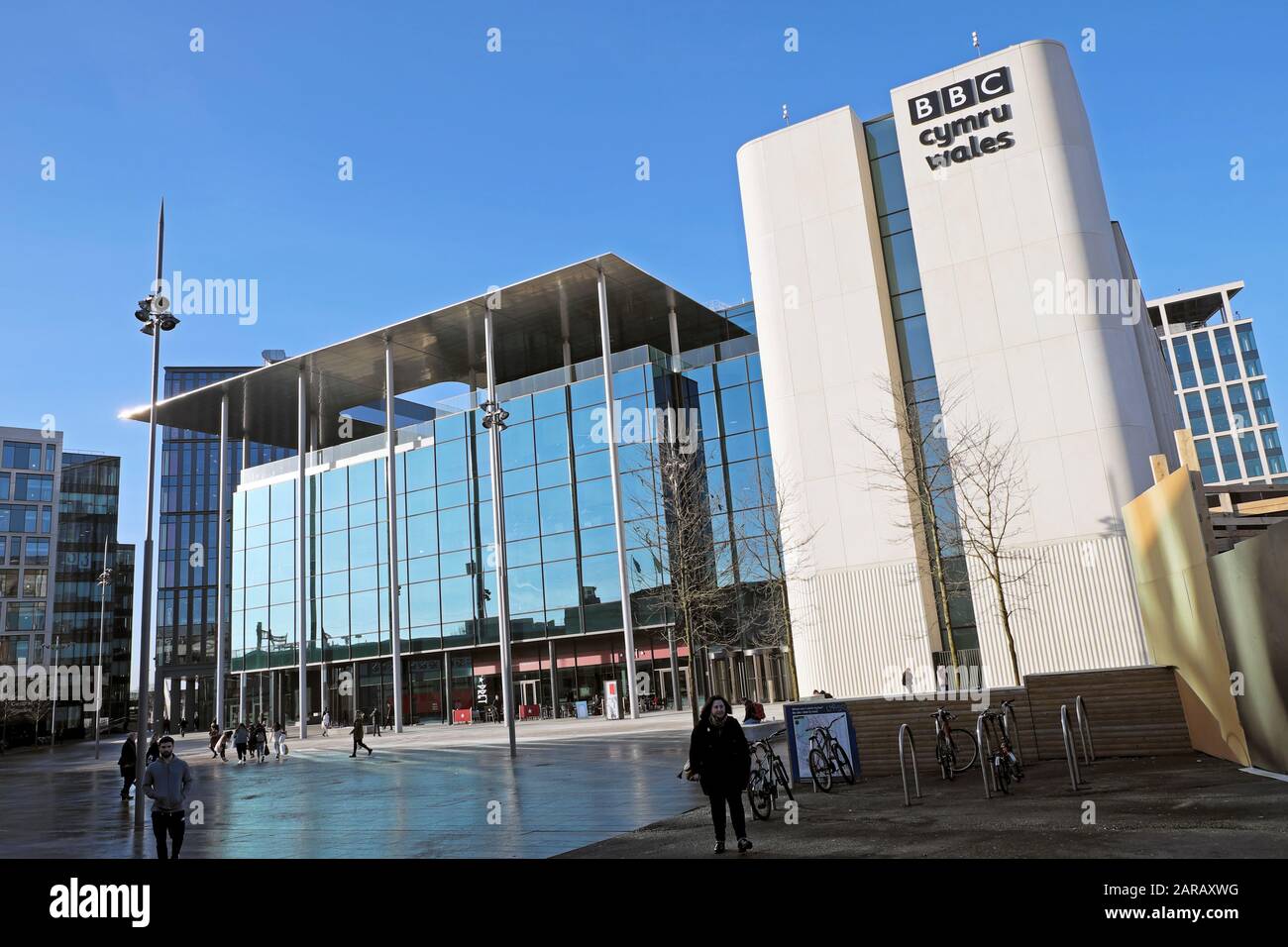 People walking in Central Square outside BBC Wales Cardiff headquarters near the railway station in the city centre Wales UK  KATHY DEWITT Stock Photo