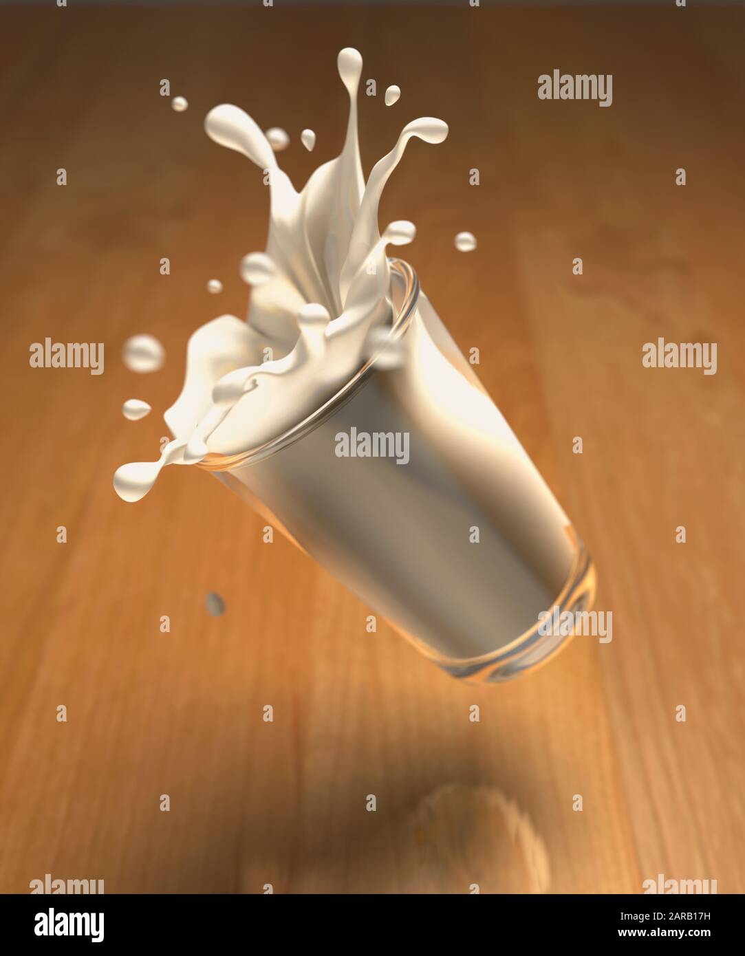 No use crying over split milk. Glass of milk falling onto a wooden floor Stock Photo