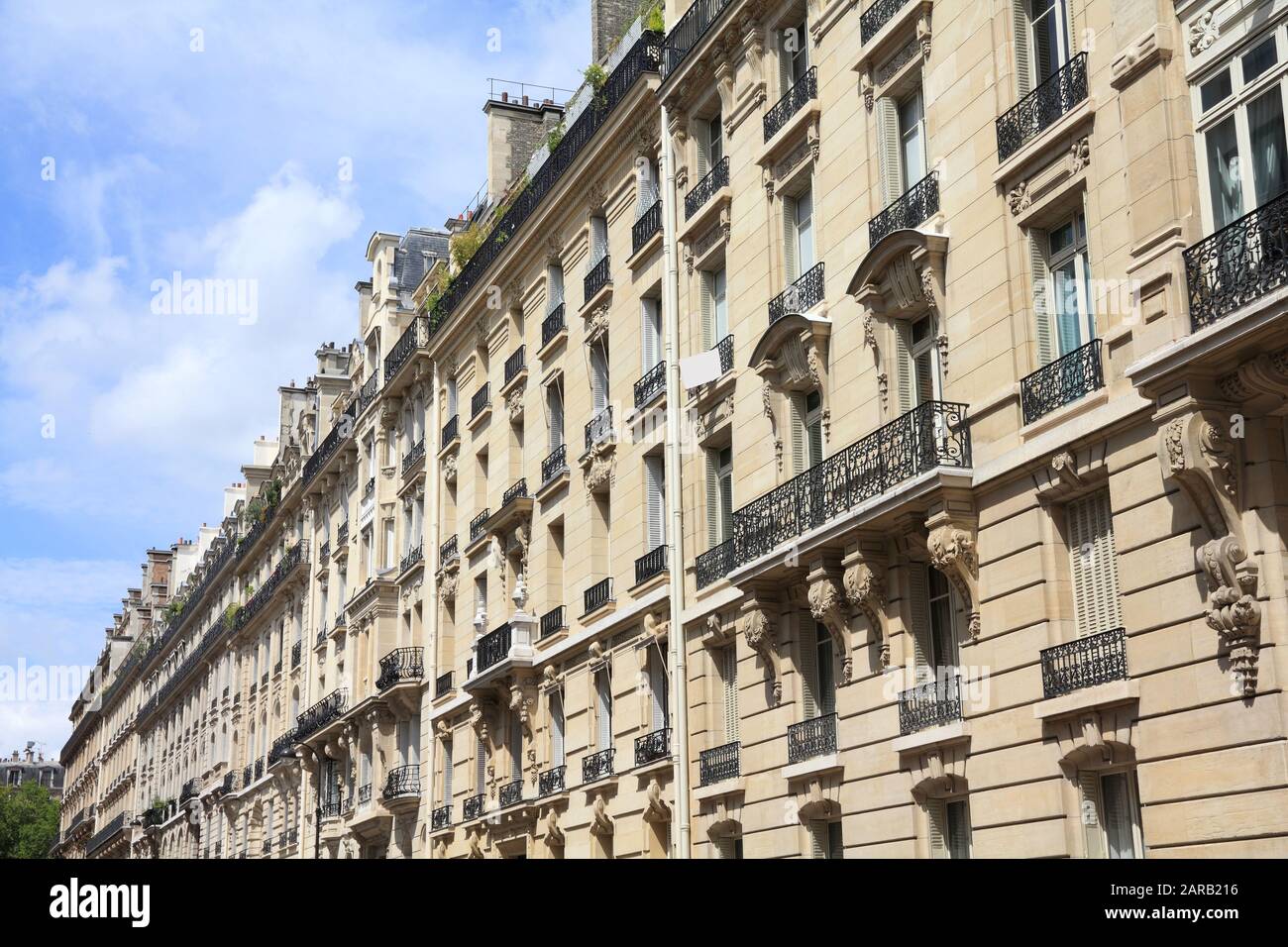 Paris, France - typical old apartment buildings. Windows and balconies. Stock Photo