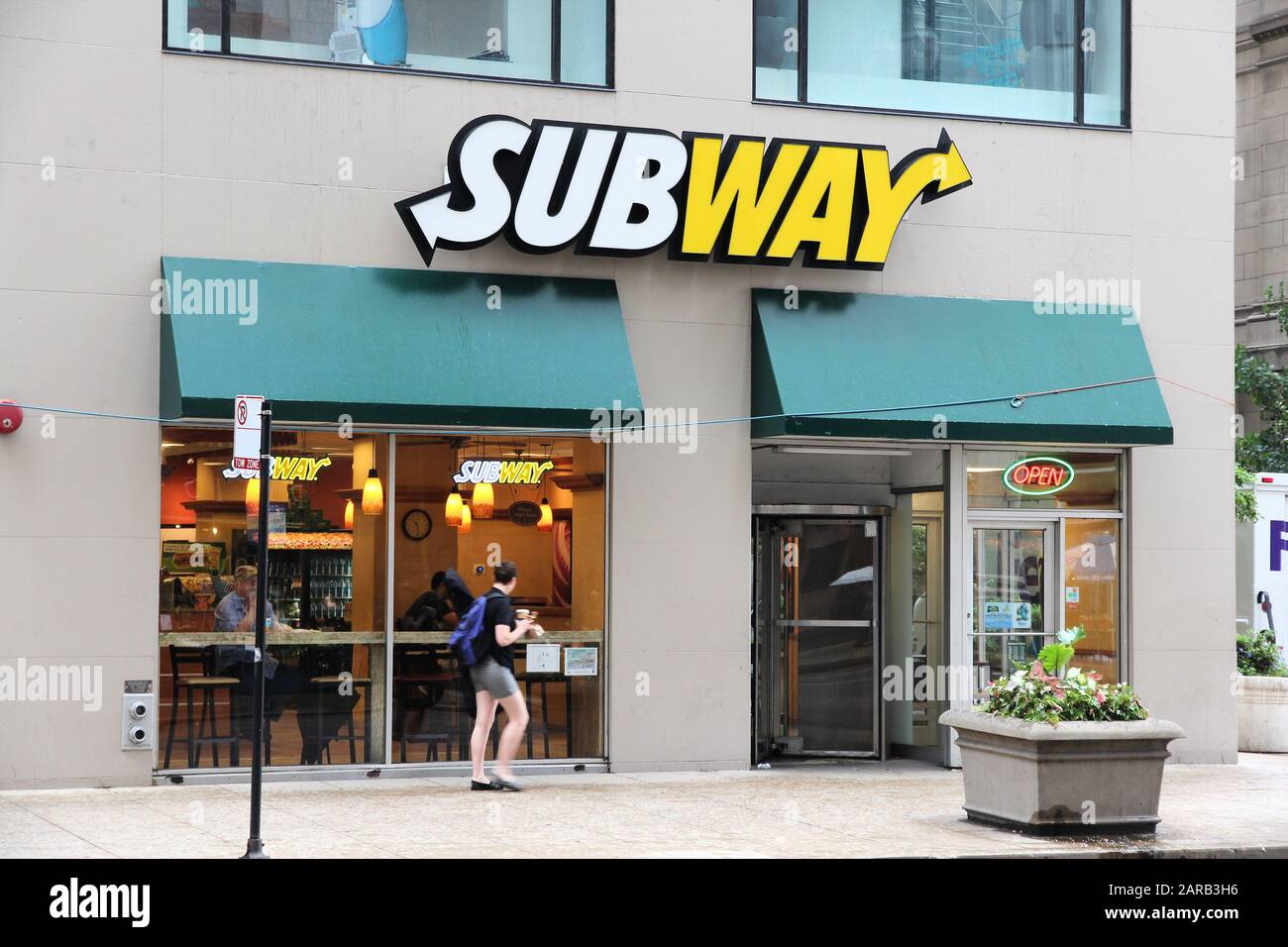 CHICAGO, USA - JUNE 26, 2013: People visit Subway sandwich store in Chicago. Subway is one of fastest growing restaurant franchises with 39,747 restau Stock Photo