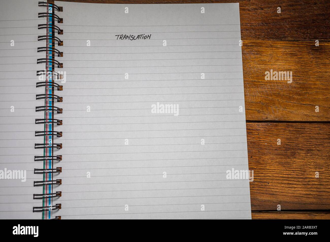 Translation, handwriting text on page of office agenda, office spiral