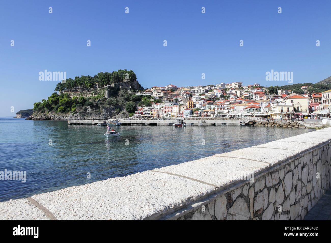 Viewed here and set in the Ionian Sea lies the beautiful Greek Town of Parga with it's Venetian Castle overlooking. Stock Photo