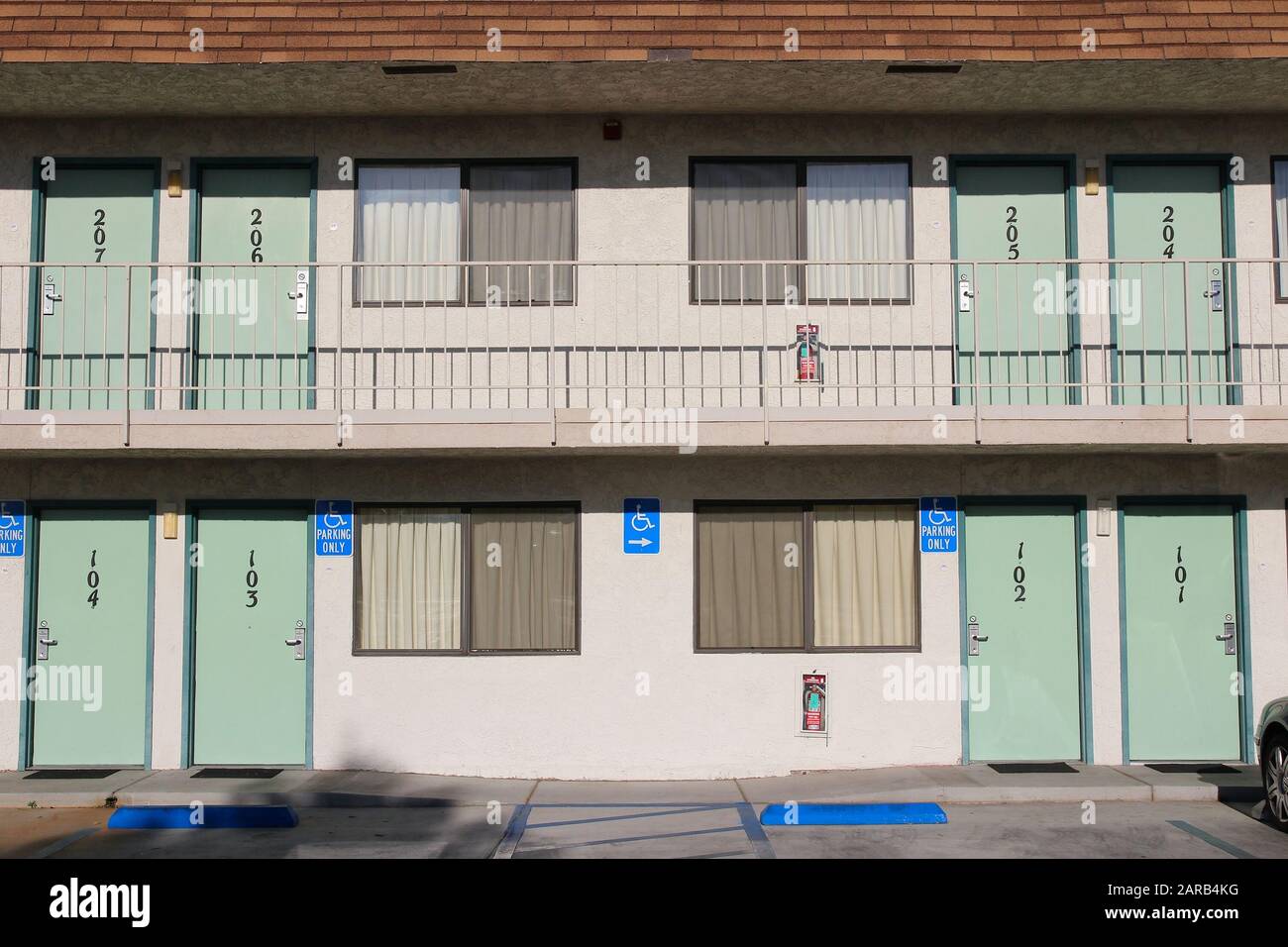 Generic American motel in California. Motel room doors. Stock Photo