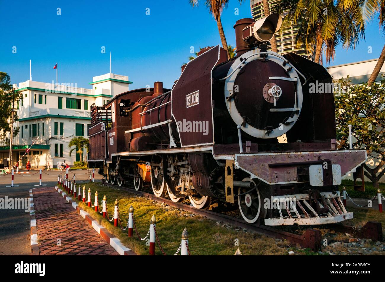 Franco-Belge steam locomotive 106 built in 1912 on static display at Phnom Penh station, Cambodia. Near the main entrance. Stock Photo