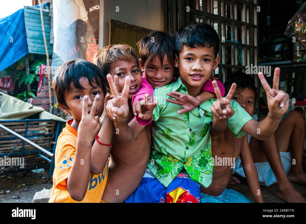 Children at the shanty town on the sides of the railway tracks near the rail yard in Phnom Penh, Cambodia. Stock Photo