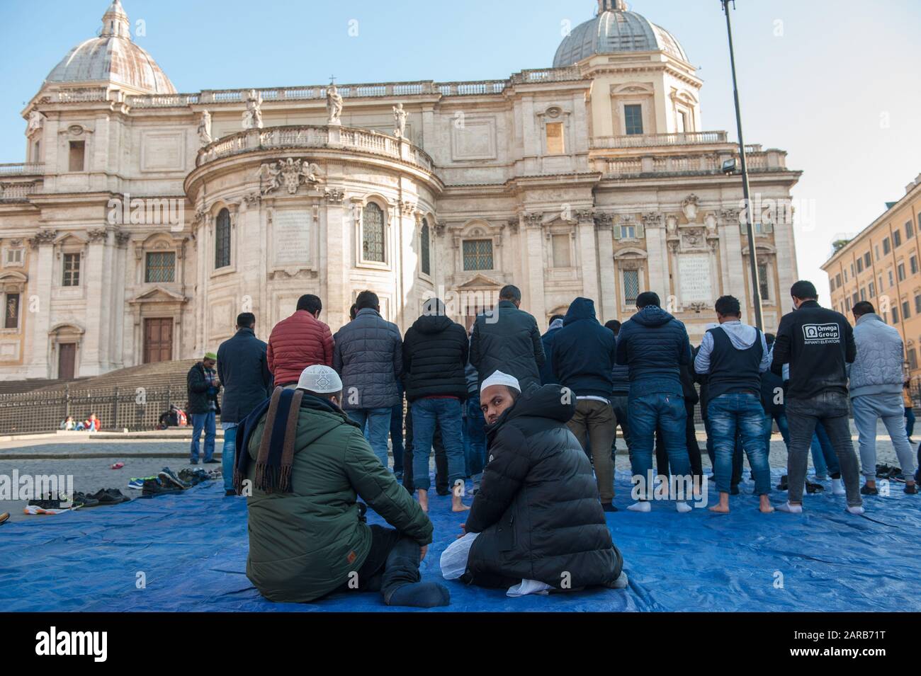 Rome, Italy. 17th Jan, 2020. Muslims attend Friday prayer during a demonstration in Esquilino Square in Rome, Italy. The Muslim community take to stre Stock Photo