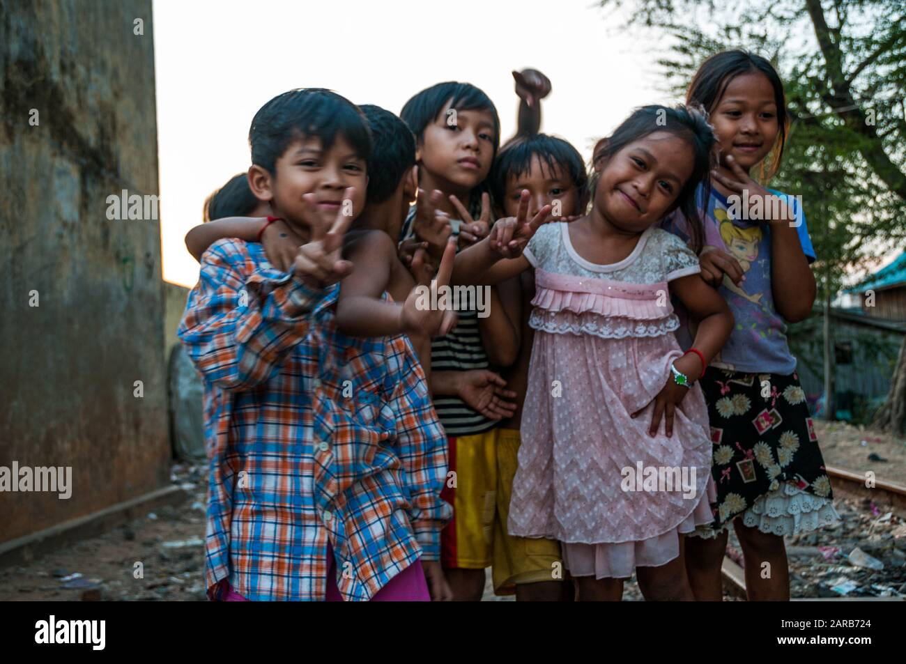 Children at the shanty town on the sides of the railway tracks near the rail yard in Phnom Penh, Cambodia. Stock Photo