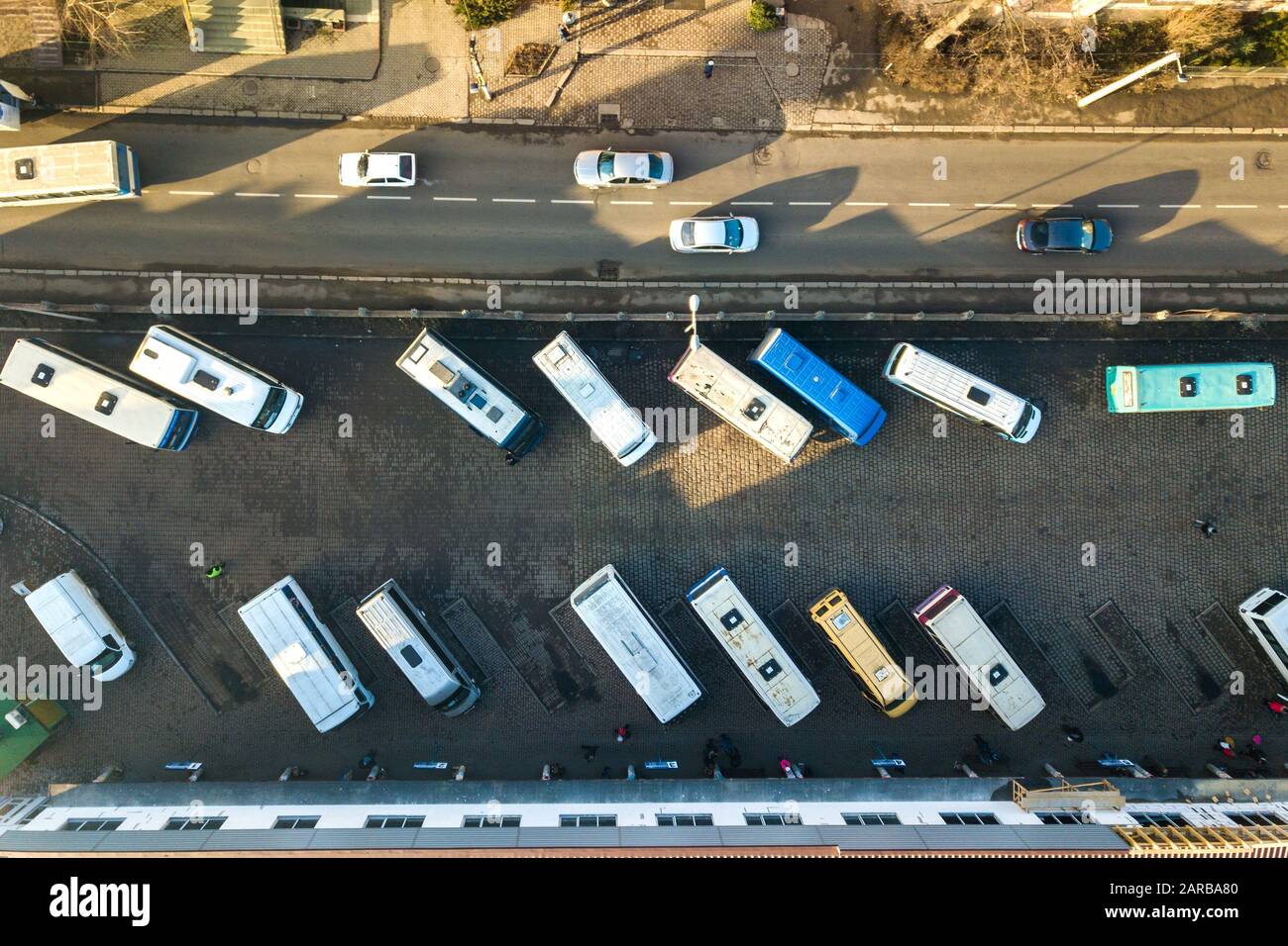 Aerial view of many cars and buses moving on a busy city street Stock ...