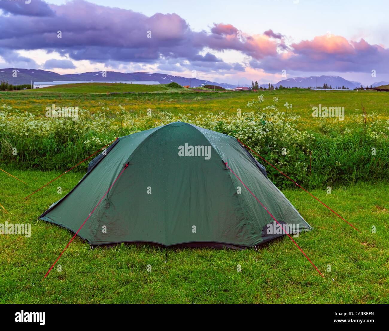 Green tent on the camping in Iceland, travel outdoor summer background