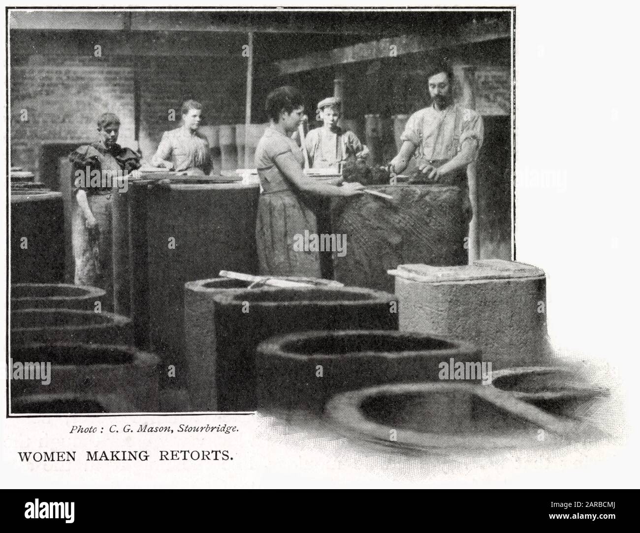 Women Making Ceramic Retorts Stock Photo