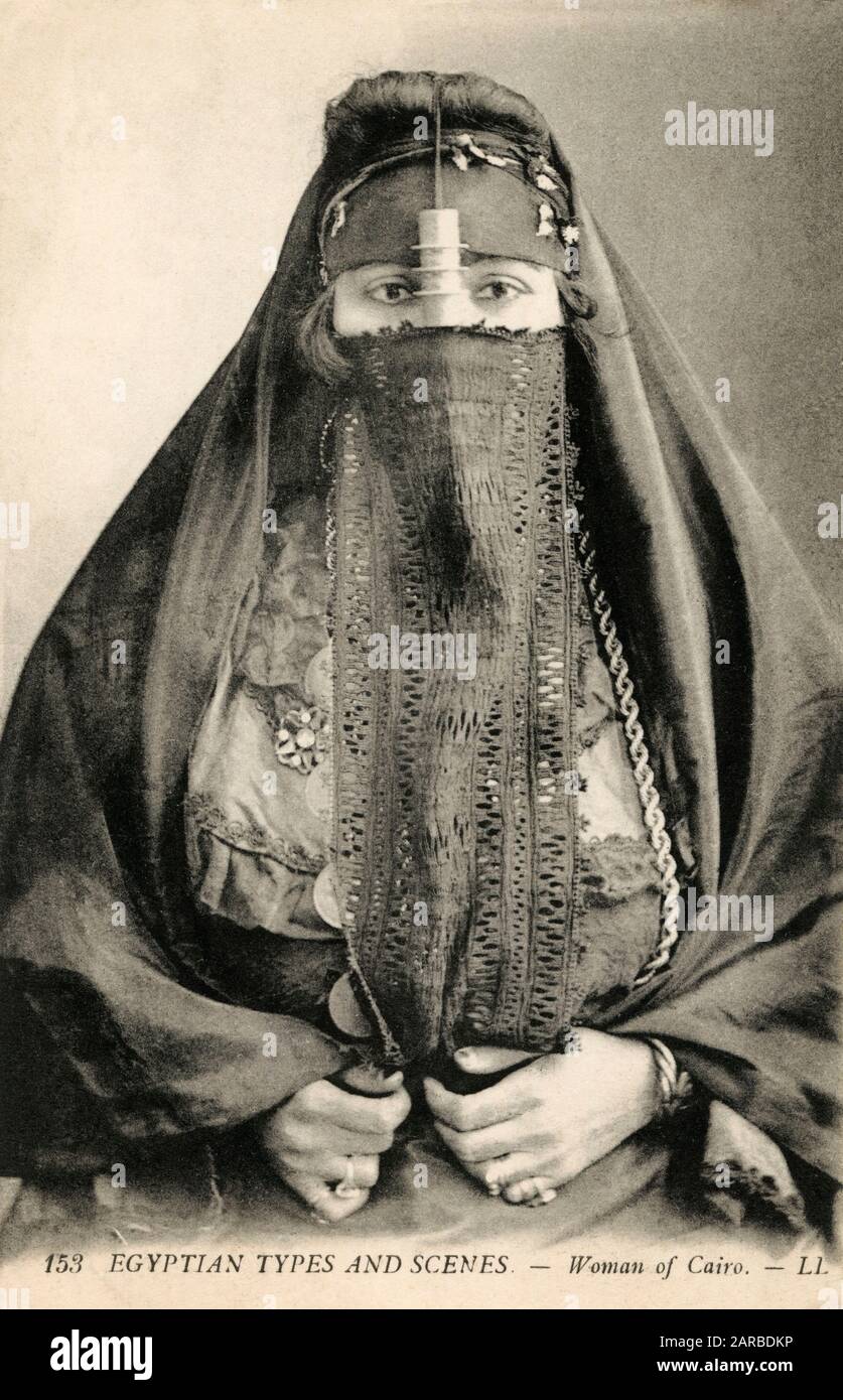 Woman from Cairo - Veiled     Date: circa 1908 Stock Photo