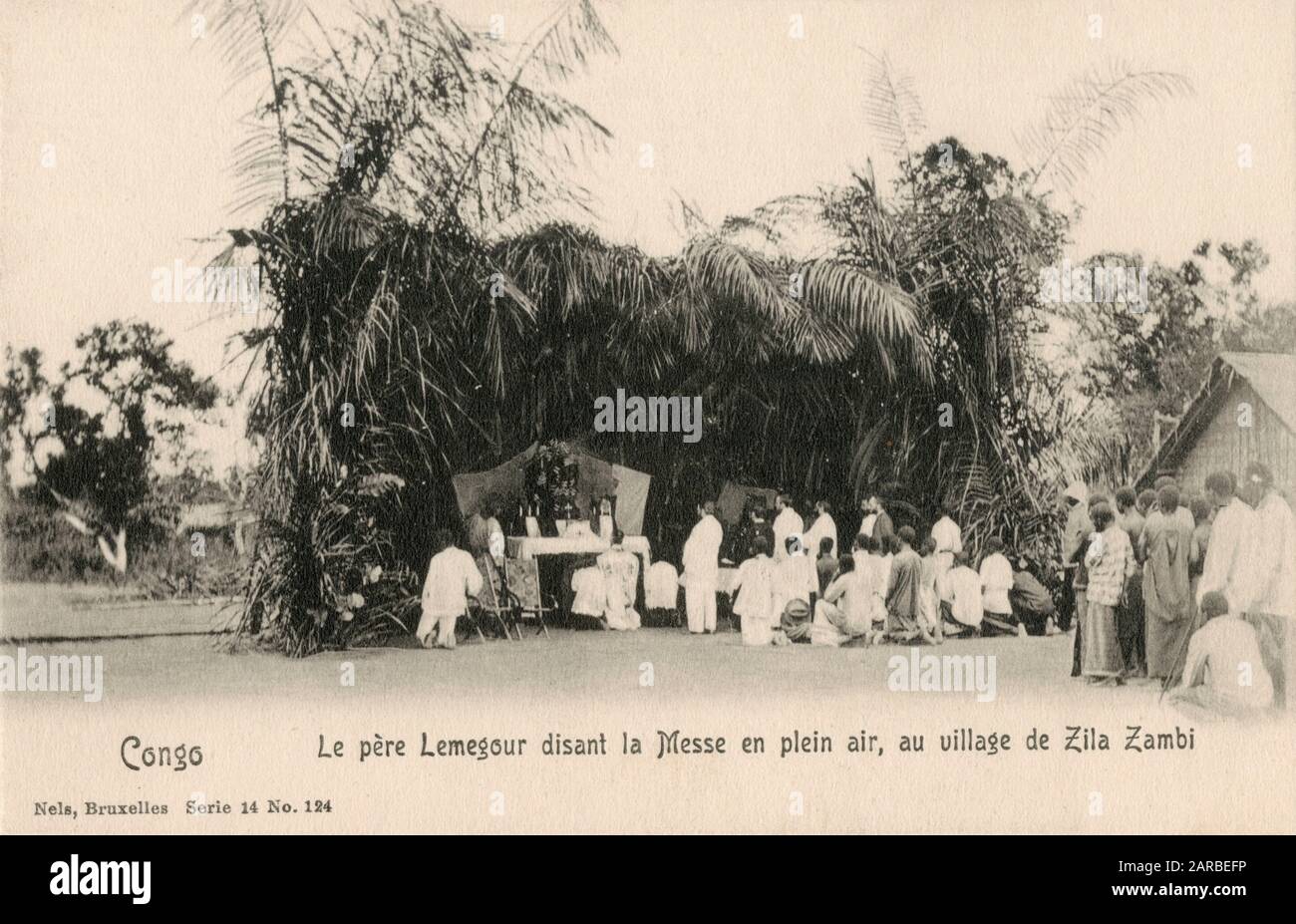 Father Lemegour conducts Mass at the Village of Zila Zambi- Belgian Congo, Central Africa.     Date: circa 1908 Stock Photo