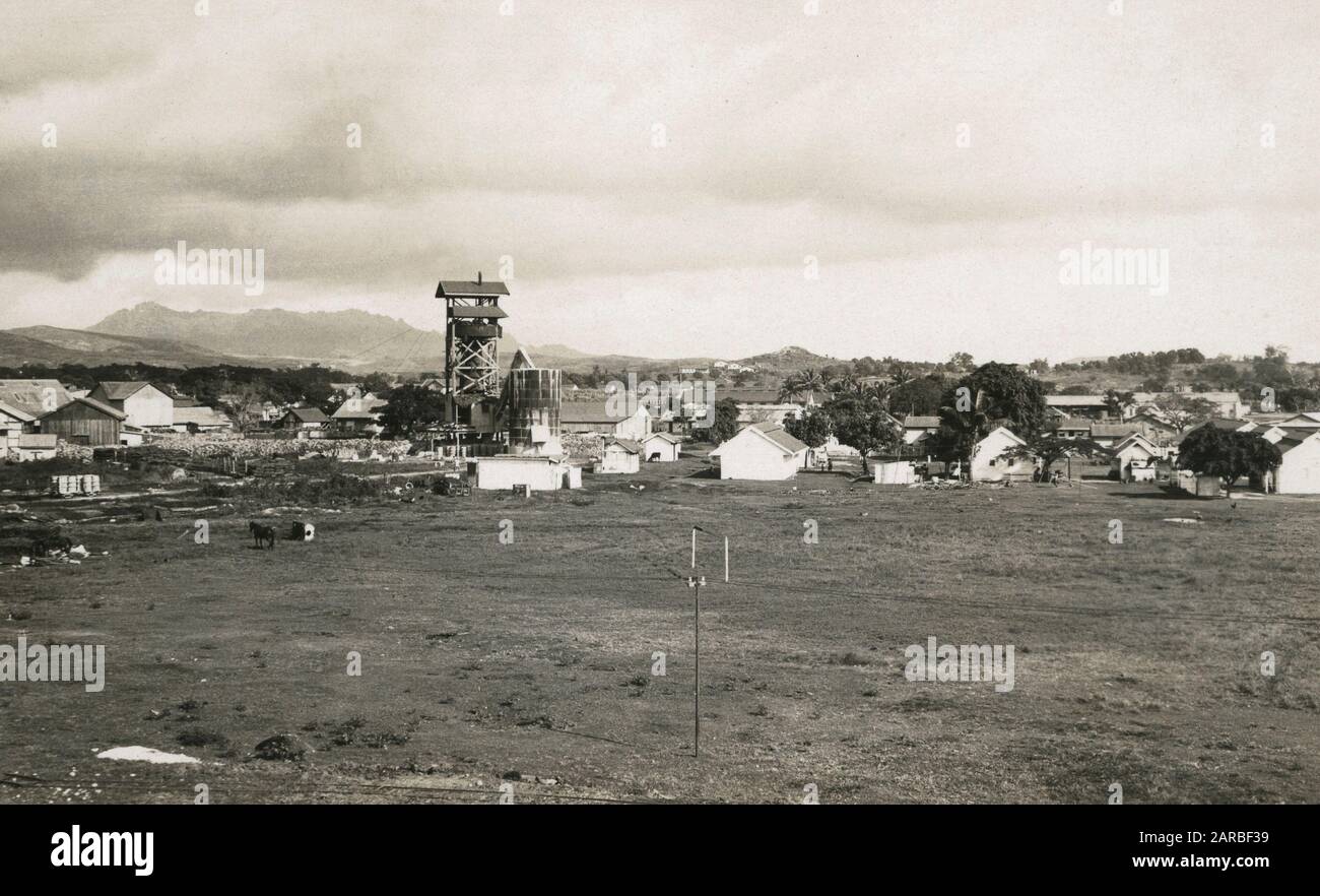 View of Lautoka Sugar Mill with football pitch and town buildings, Viti Levu Island, Fiji, South Pacific.      Date: circa 1920 Stock Photo
