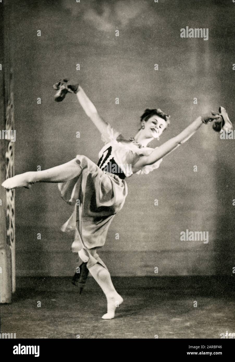 Julia Farron (1922-2019) - Ballet Dancer performing as 'Mademoiselle Theodore' in 'The Prospect Before Us', scene 1, a one-act comic ballet in seven scenes, choreographed for the Vic-Wells Ballet by Ninette de Valois to music by William Boyce arranged by Constant Lambert.     Date: 1940 Stock Photo