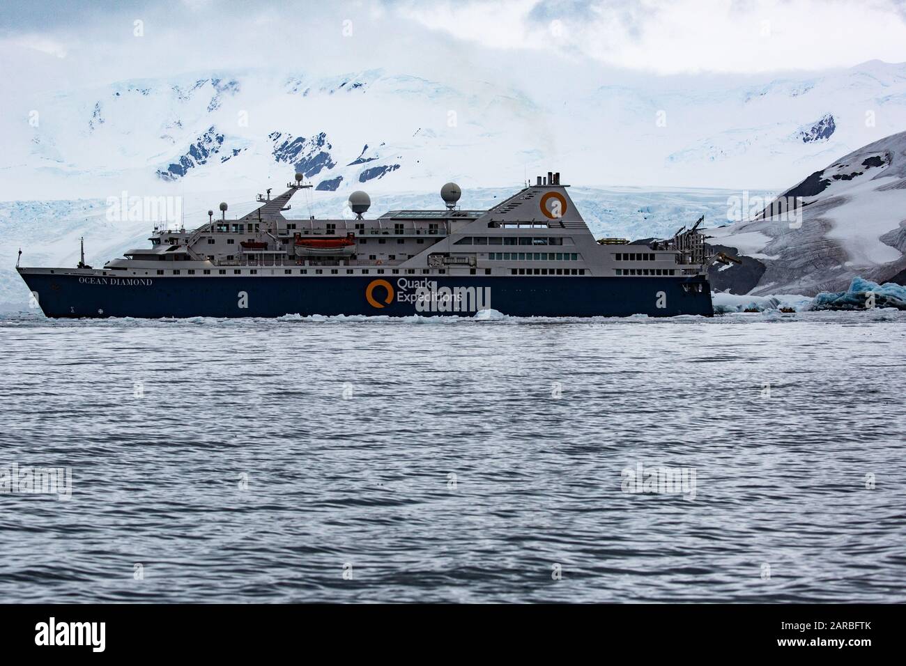 Antarctic passenger cruise ship off the icy shores of Antarctica (Ocean Diamond Quark Expeditions) Stock Photo