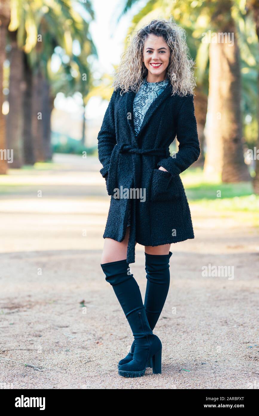 Woman blonde curly hair hi-res stock photography and images - Alamy