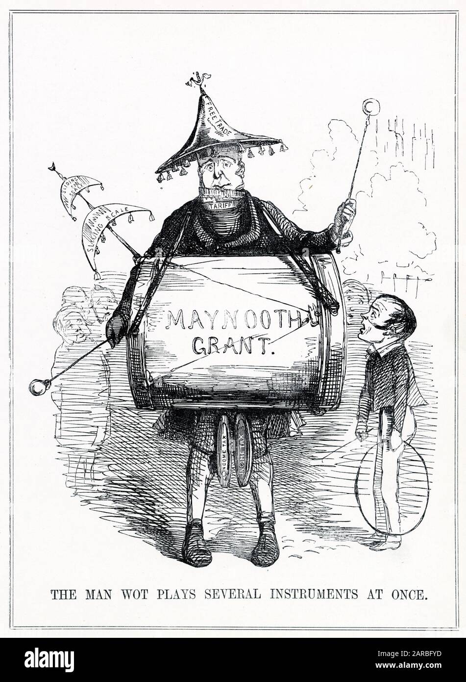 Cartoon, The Man Wot Plays Several Instruments At Once -- a satirical comment on Sir Robert Peel's attempt to improve Protestant-Catholic relationships by increasing a grant to Maynooth College, a Catholic seminary in Ireland, which provoked great opposition in the English parliament. Peel is depicted banging a big drum, while Lord John Russell, typically depicted as a small boy, looks up at him in puzzlement. Stock Photo