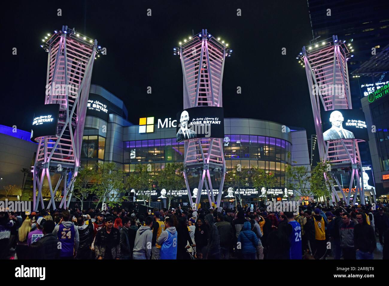Los Angeles, United States. 27th Jan, 2020. LA Laker fans gather in a plaza at LA LIVE near the Staples Center in Los Angeles to mourn the loss of NBA star Kobe Bryant. Bryant, his daughter Gianna, 13, and seven other people were killed in a helicopter crash in Calabasas, California on Sunday, January 26, 2020. Photo by Chris Chew/UPI Credit: UPI/Alamy Live News Stock Photo