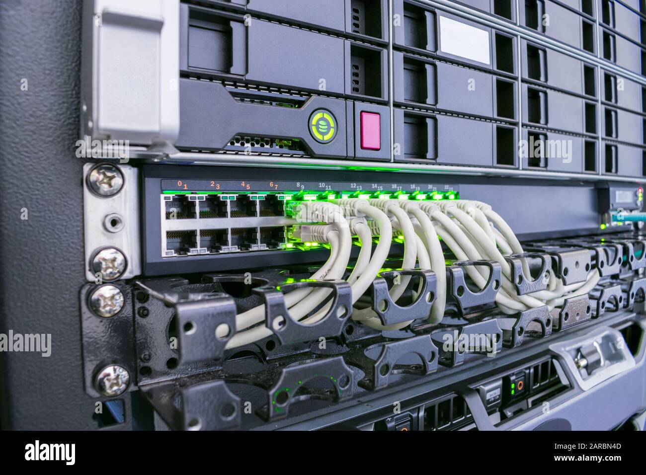 Access servers connect to the Internet switch. The database store is  located in the server room of the data center. Mining bitcoins and crypto  currenc Stock Photo - Alamy