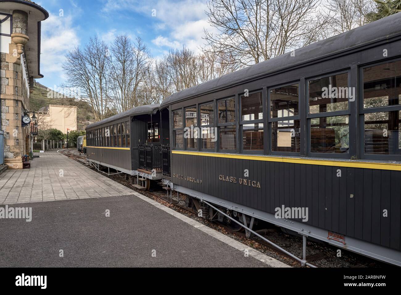 Old train car with wooden seats in the Basque Railway Museum one of the most important of its kind in Europe. Railway history of Euskadi in Azpeitia Stock Photo