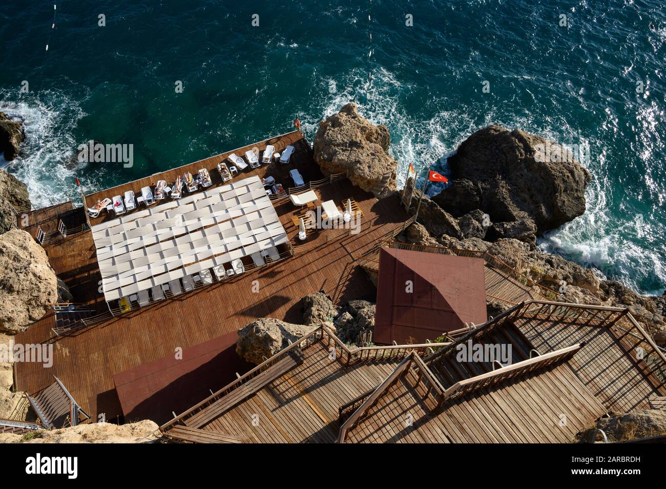 Oz Hotels in Antalya, Turkey - Seaside resort sun terrace built into the cliffs on the Mediterranean coast Stock Photo