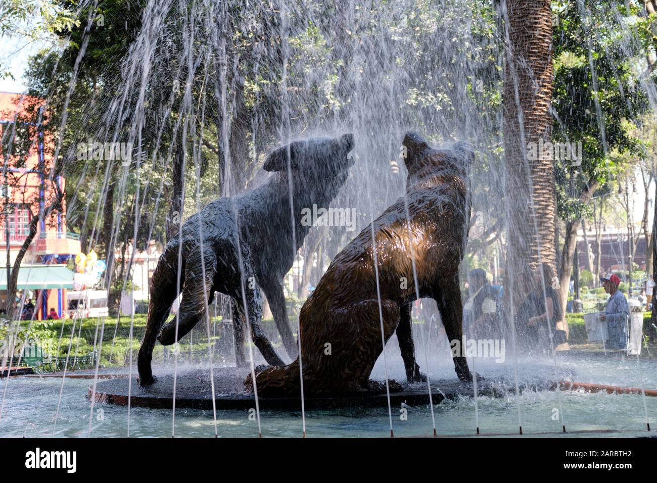 Two coyotes statue in middle of a fountain in the Coyoacan neighbourhood of Mexico City Stock Photo