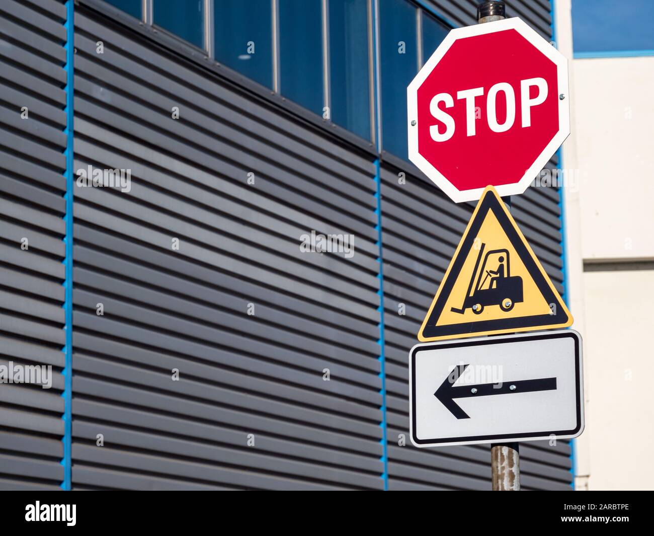 Warning stop sign forklift has right of way Stock Photo