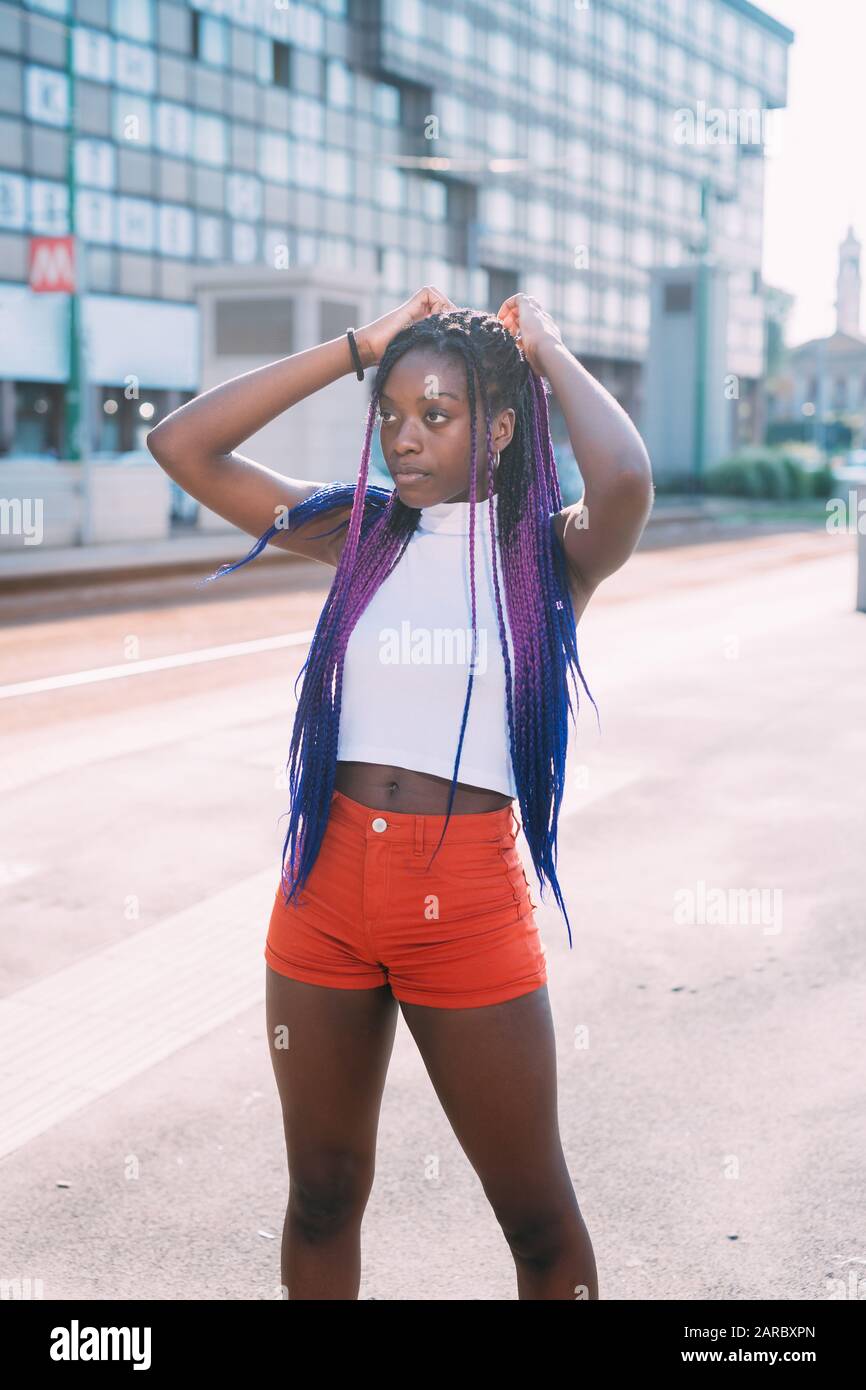 Young beautiful black woman outdoor overlooking pensive - attitude, girl  power, contemplation concept Stock Photo - Alamy