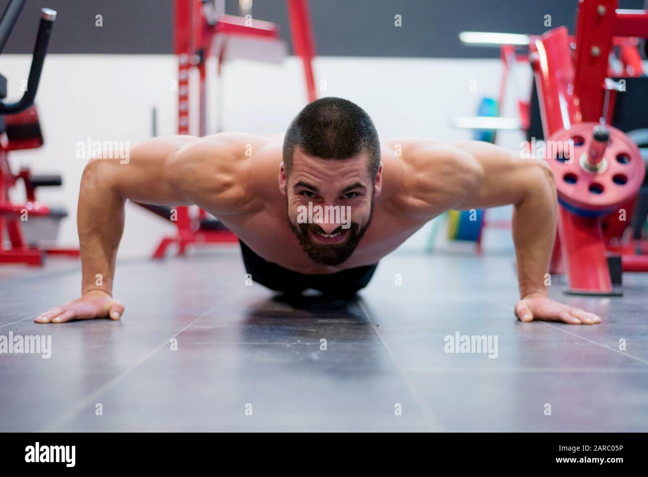 Hard Core Bodybuilding. Muscular athletic bodybuilder fitness model ...