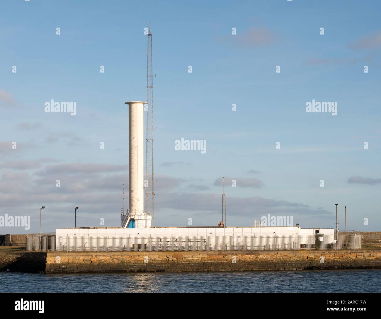 Experimental Flettner rotor, part of the Wind Assisted Ship Propulsion Project, mounted on Blyth harbour wall, Northumberland, England, UK Stock Photo