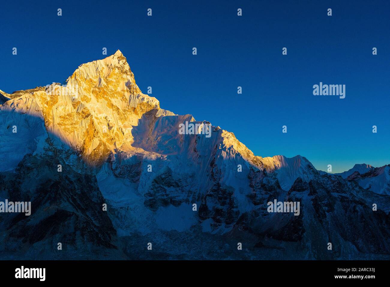 Sharp Himalayan peak ( Nuptse ) at sunset, Khumbu,Nepal Himalayas Stock