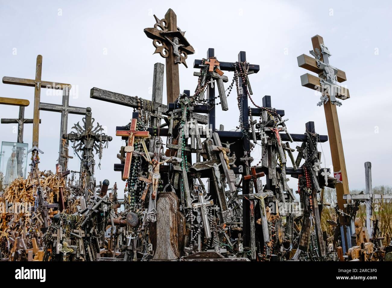 Hundreds of wooden crosses at Lithuania's Hill of Crosses pilgrimage site Stock Photo