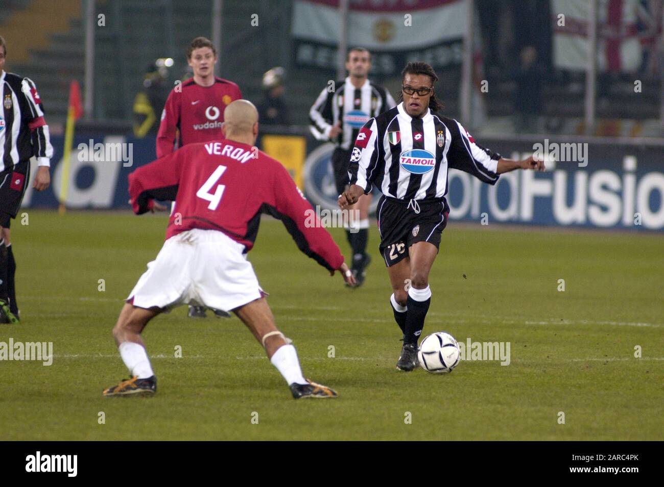Turin Italy ,12 March  2003, 'Delle Alpi' Stadium, UEFA Champions League 2002/2003, FC Juventus- FC Manchester United: Edgar Davids and Veron in action during the match Stock Photo
