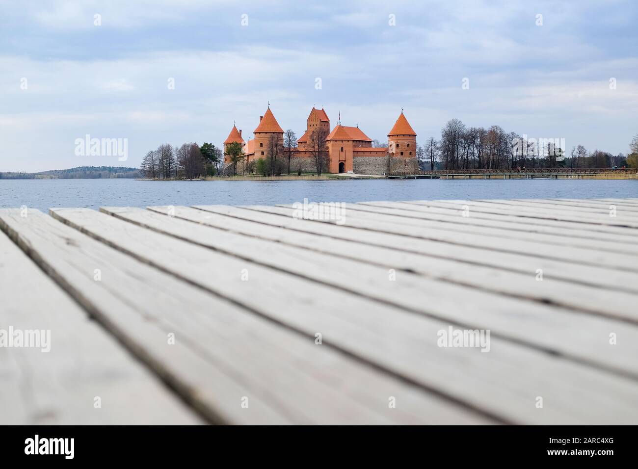 Trakai Island Castle in Lithuania with blurred boardwalk in foreground Stock Photo
