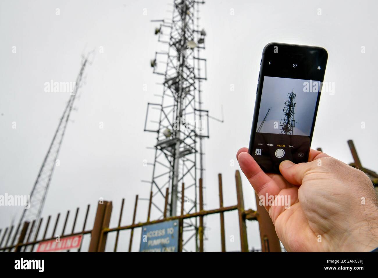 A mobile phone next to telecom masts near Dundry, Somerset. Britain's sovereignty is at risk if the country allows Chinese tech giant Huawei to help build its 5G infrastructure, the US Secretary of State has warned. PA Photo. Picture date: Monday January 27, 2020. Mike Pompeo described the decision facing the National Security Council as 'momentous' in a last-ditch plea to ministers who are expected to make the call on Tuesday. See PA story POLITICS Huawei. Photo credit should read: Ben Birchall/PA Wire Stock Photo